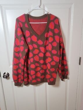 Brown V-Neck Sweater with Pink and Coral Spot Pattern